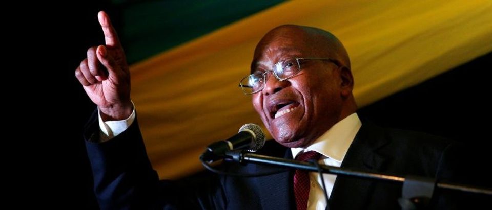 South African President Jacob Zuma sings at the City Hall in Pietermaritzburg