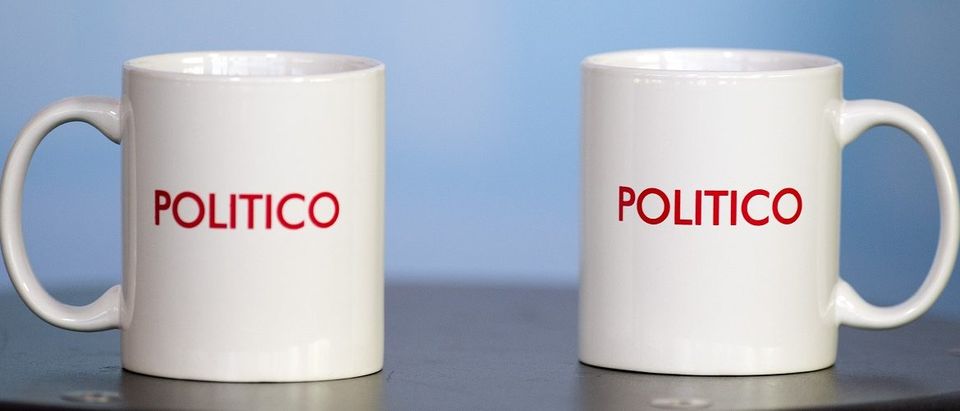 Two Politico coffee mugs rest on a table during the Politico Playbook Breakfast at the Newseum in Washington, DC, November 28, 2012. Jim Watson/AFP/Getty Images.