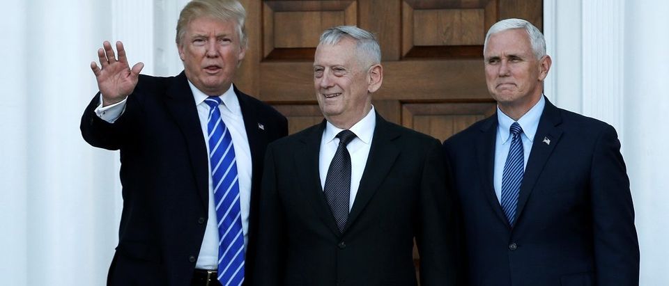 U.S. President-elect Donald Trump and Vice President-elect Mike Pence greet retired Marine General James Mattis for a meeting at the main clubhouse at Trump National Golf Club in Bedminster
