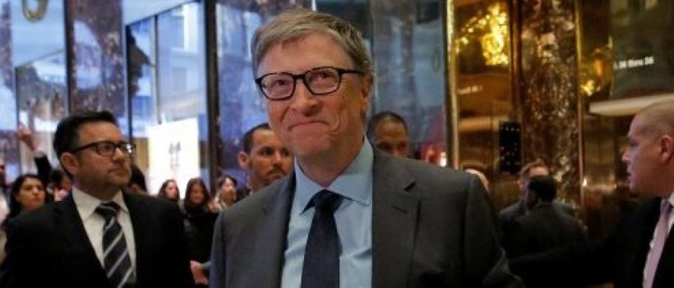 Businessman Bill Gates exits through the lobby at Trump Tower in Manhattan, New York City