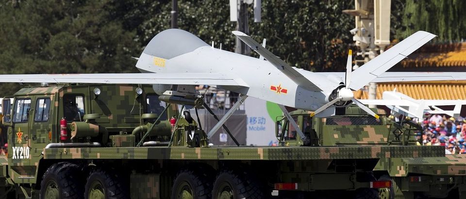 Military vehicles carrying Wing Loong, a Chinese-made medium altitude long endurance unmanned aerial vehicle, take part in a military parade to commemorate the 70th anniversary of the end of World War II in Beijing