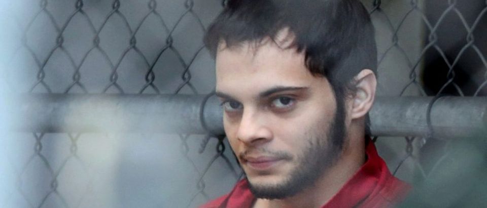 Esteban Santiago is taken from the Broward County main jail as he is transported to the federal courthouse in Fort Lauderdale