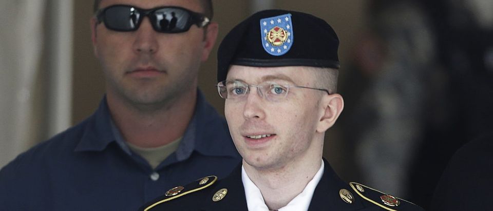 U.S. Army Private First Class Bradley Manning (C) departs the courthouse at Fort Meade, Maryland July 30, 2013. A military judge on Tuesday found Manning not guilty of aiding the enemy - the most serious charge among many he faced for handing over documents to WikiLeaks. But Col. Denise Lind, in her verdict, found Manning, 25, guilty of 19 of the other 20 criminal counts in the biggest breach of classified information in the nation's history. REUTERS/Gary Cameron