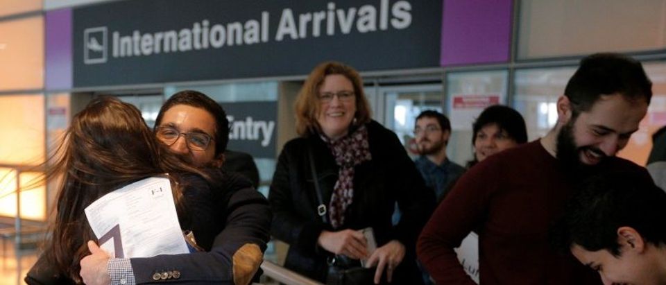 Behnam Partopour, a Worcester Polytechnic Institute student from Iran, is greeted by his sister Bahar at Logan Airport after he cleared U.S. customs and immigration on an F1 student visa in Boston