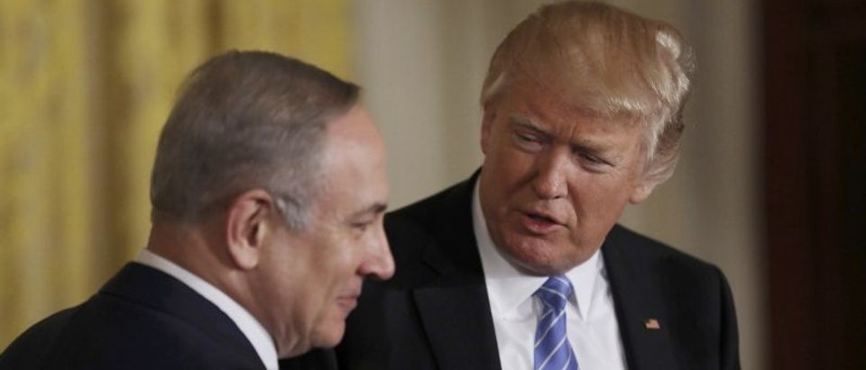 U.S. President Trump looks to Israeli Prime Minister Netanyahu during joint news conference at the White House in Washington