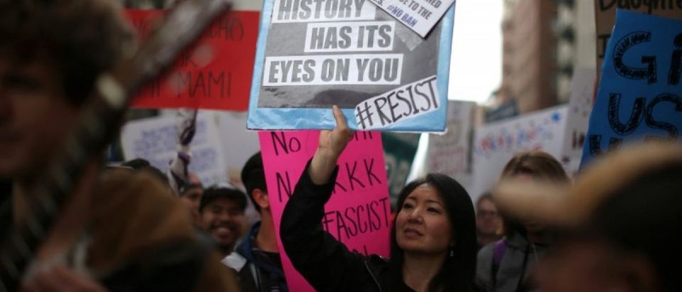 People participate in a protest march calling for human rights and dignity for immigrants, in Los Angeles, February 18, 2017. REUTERS/Lucy Nicholson