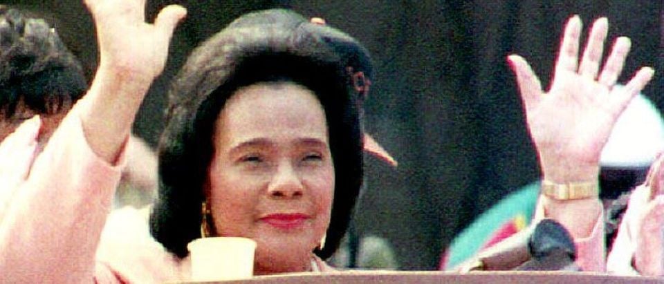 WASHINGTON, DC - AUGUST 28: Coretta Scott King, widow of Martin Luther King Jr., waves to the crowd, 28 August 1993, after delivering a speech during the celebration of the 30th anniversary of the March on Washington. (ROBERT GIROUX/AFP/Getty Images)
