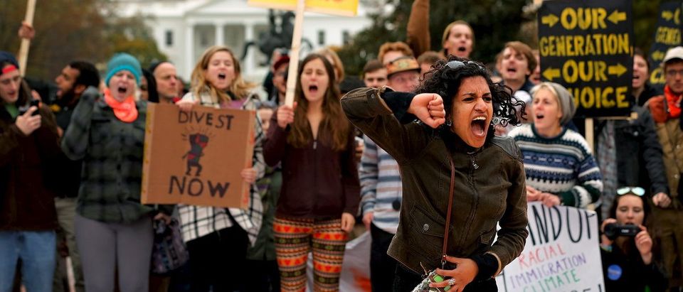 Varshini Prakash of the Divestment Student Network leads chants of "I believe that we will win" during the 'Our Generation, Our Choice' protest near the White House in downtown Washington November 9, 2015. The Monday march to highlight race, climate, and immigration issues was timed to mark exactly one year until the 2016 U.S. presidential election, according to protesters. (REUTERS/Jonathan Ernst)