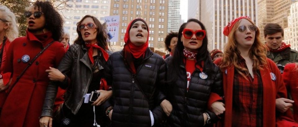 Organizers Linda Sarsour (C), Carmen Perez (2nd R) and Bob Bland (R) lead during a 'Day Without a Woman' march on International Women's Day in New York, U.S., March 8, 2017. REUTERS/Lucas Jackson