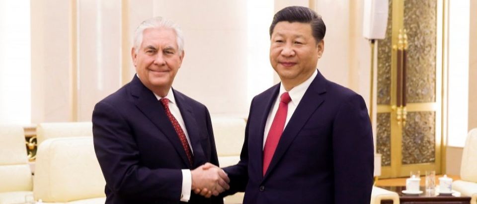 China's President Xi Jinping shakes hands with U.S. State of Secretary, Rex Tillerson at the Great Hall of the People in Beijing