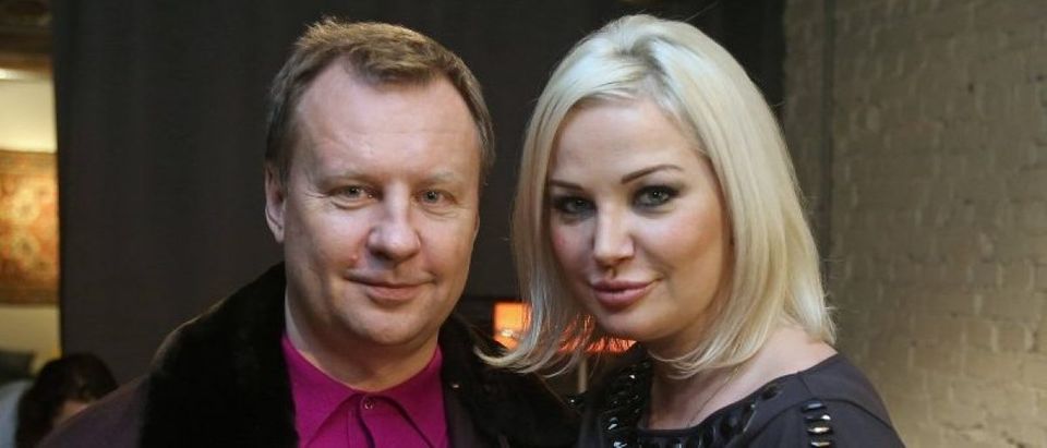 Former lawmaker of Russian State Duma Voronenkov and his wife Maksakova pose for picture during screening of movie "Nemtsov" in Kiev