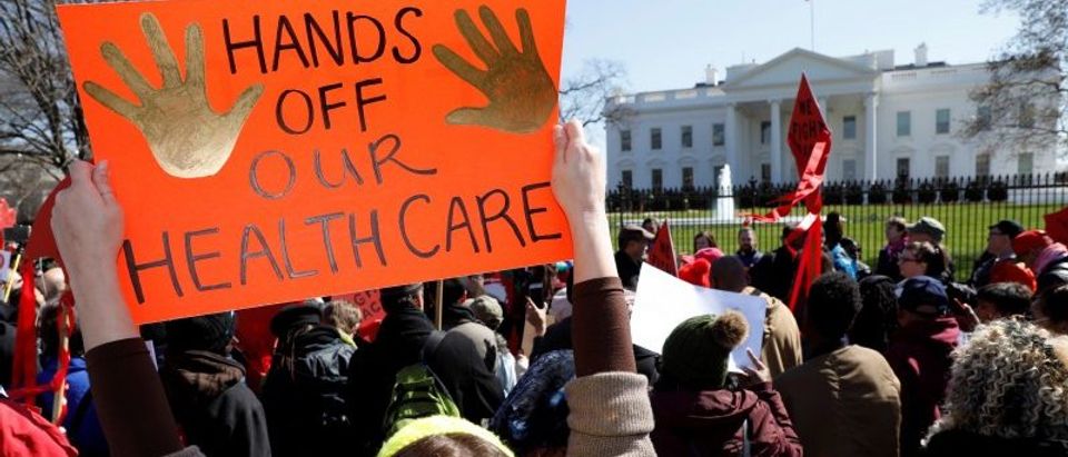 Healthcare demonstrators protest at the White House in Washington