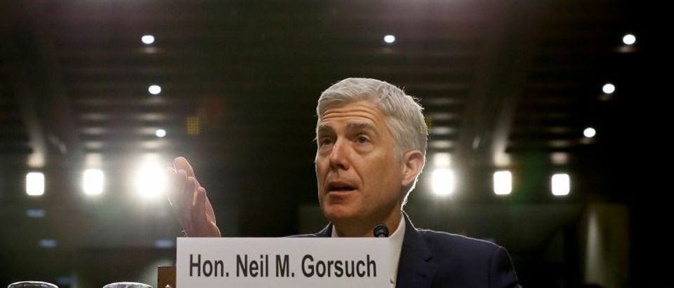 FILE PHOTO - Neil Gorsuch responds to a question during his Senate Judiciary Committee confirmation hearing in Washington