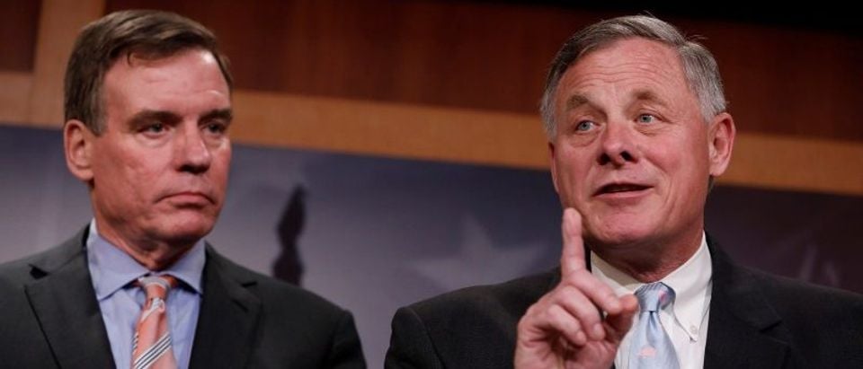 Senate Intelligence Committee Chairman Sen. Richard Burr, accompanied by Senator Mark Warner, vice chairman of the committee, speaks at a news conference to discuss their probe of Russian interference in the 2016 election on Capitol Hill in Washington
