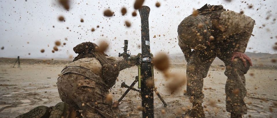 Marines assigned to Weapons Company, 1st Battalion, 3rd Marine Regiment, fire a M252A2 81mm mortar system at Range 106 during Integrated Training Exercise 2-17, at Marine Corps Air Ground Combat Center, Twentynine Palms, Calif., Jan. 13, 2017. ITX is a combined-arms exercise which provides all elements of the Marine Air Ground Task Force an opportunity to utilize capabilities during large scale missions to become a more ready fighting force. 1/3 is currently participating as the ground combat element for this exercise. (U.S. Marine Corps photo by Cpl. Aaron S. Patterson)