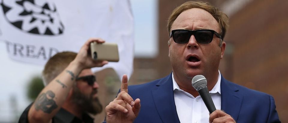 Alex Jones from Infowars.com speaks during a rally in support of Republican presidential candidate Donald Trump near the Republican National Convention in Cleveland