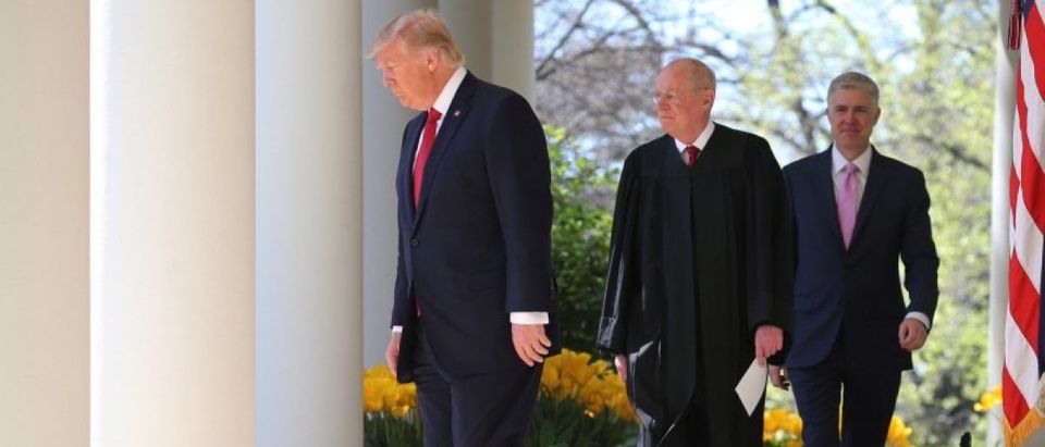 U.S. President Trump, Supreme Court Associate Justice Kennedy and Judge Gorsuch arrive at a swearing in ceremony for Judge Gorsuch as an Associate Justice of the Supreme Court in the Rose Garden of the White House in Washington,