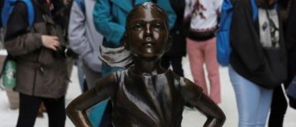 FILE PHOTO: The 'Fearless Girl' statue which stands in front of Wall Street's Charging Bull statue is seen in New York