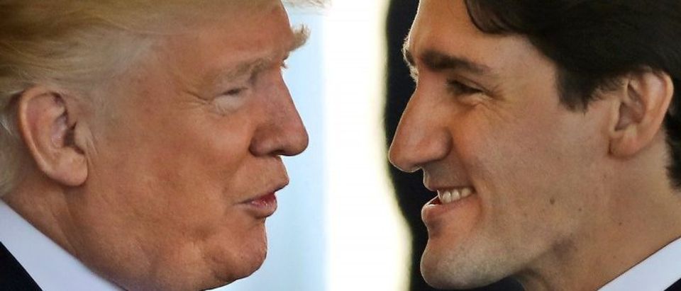 FILE PHOTO: Canadian Prime Minister Justin Trudeau is greeted by U.S. President Donald Trump prior to holdiing talks at the White House in Washington