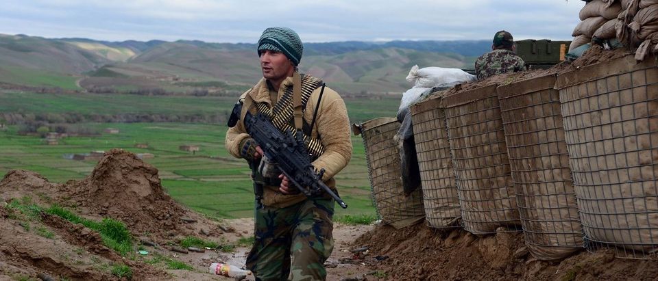 The operation started after Taliban insurgents captured an Afghan policestation in the village of Darwish Mohammadi, some 10 kms away from the district centre. Hoshang Hashimi/AFP/Getty Images.