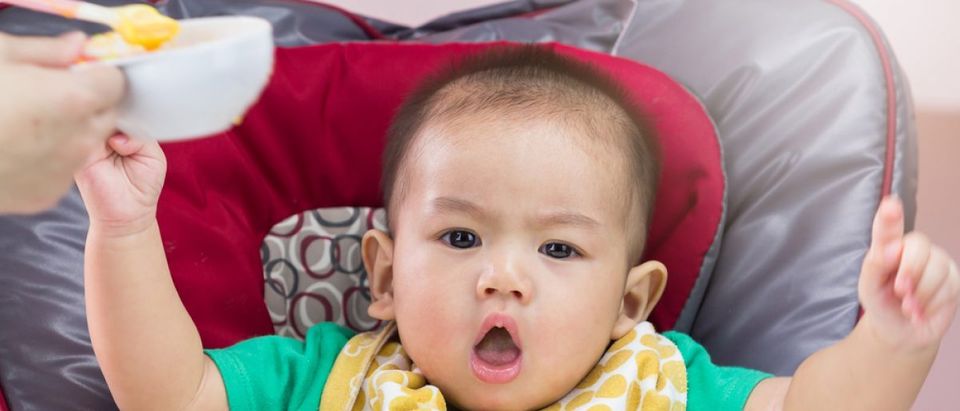 Baby doesn't want food (Shutterstock/Jat306)