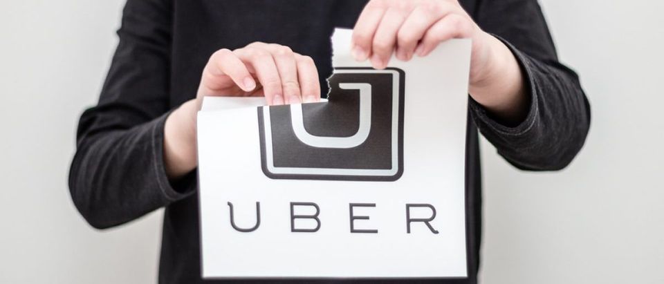 Uber is being hit from all angles. [Shutterstock - AlesiaKan]