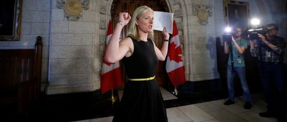 Canada's Environment Minister Catherine McKenna gestures as she arrives to speak to journalists on Parliament Hill in Ottawa