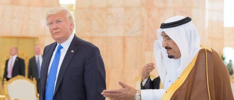 Saudi Arabia's King Salman bin Abdulaziz Al Saud welcomes U.S. President Donald Trump during a reception ceremony in Riyadh
