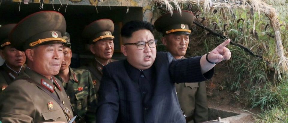 FILE PHOTO: North Korean leader Kim Jong Un inspects the defence detachment on Jangjae Islet and the Hero Defence Detachment on Mu Islet
