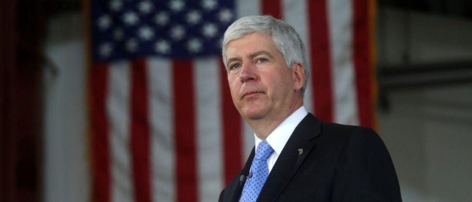 Michigan Governor Rick Snyder is seen at a bill signing event in Detroit, Michigan, U.S. on June 20, 2014. Picture taken on June 20, 2014. REUTERS/Rebecca Cook