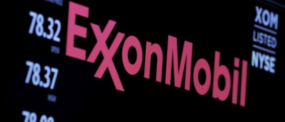 The logo of Exxon Mobil Corporation is shown on a monitor above the floor of the New York Stock Exchange in New York, December 30, 2015. (REUTERS/Lucas Jackson)
