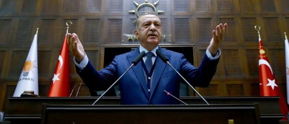 Turkish President Tayyip Erdogan addresses members of parliament from his ruling AK Party (AKP) during a meeting at the Turkish parliament in Ankara