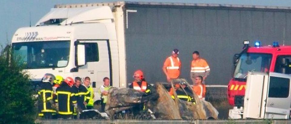 Migrants blocked a highway in Calais, causing one driver to die in a fiery crash last week. (SEBASTIEN FOISSEL/AFP/Getty Images)