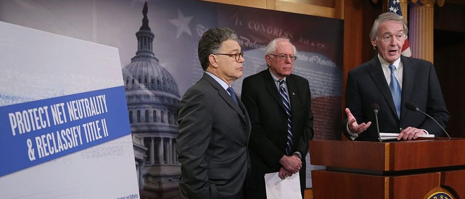 WASHINGTON, DC - FEBRUARY 04: Sen. Edward Markey (D-MA) (R) talks about net neutrality while flanked by Sen. Bernie Sanders (I-VT) (C), and Sen. Al Franken (D-MN), and during a news conference on Capitol Hill, February 4. 2015 in Washington, DC. Senate Democrats are calling on the Federal Communications Commission to reclassify the transmission component of broadband Internet access as a telecommunications service under Title II of the Telecommunications Act. (Photo by Mark Wilson/Getty Images)