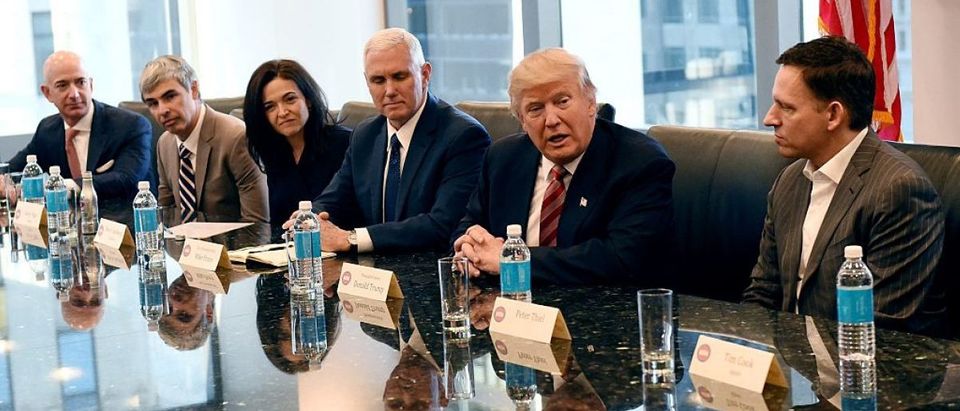 (L-R) Amazon's chief Jeff Bezos, Larry Page of Alphabet, Facebook COO Sheryl Sandberg, Vice President elect Mike Pence, President-elect Donald Trump and Peter Thiel, co-founder and former CEO of PayPal at during meetings at Trump Tower in New York December 14, 2016. (Photo: TIMOTHY A. CLARY/AFP/Getty Images)