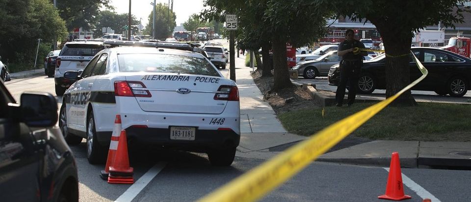 Investigators gather near the scene of an opened fire June 14, 2017 in Alexandria, Virginia. Multiple injuries were reported from the instance. (Alex Wong/Getty Images)
