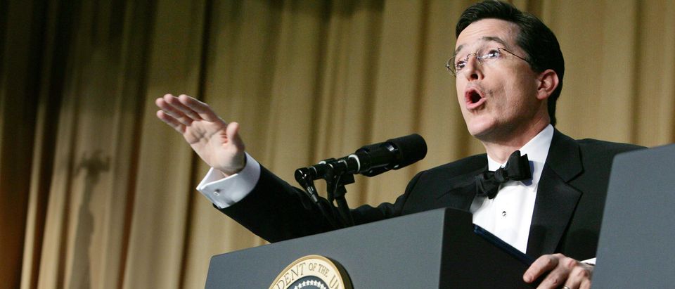 Comedian Colbert performs as U.S. President Bush watches in Washington