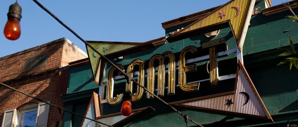 A general view of the exterior of the Comet Ping Pong pizza restaurant in Washington, U.S. December 5, 2016. The pizzeria vowed on Monday to stay open despite a shooting incident sparked by a fake news report that it was fronting a child sex ring run by Democratic presidential candidate Hillary Clinton. (REUTERS/Jonathan Ernst)