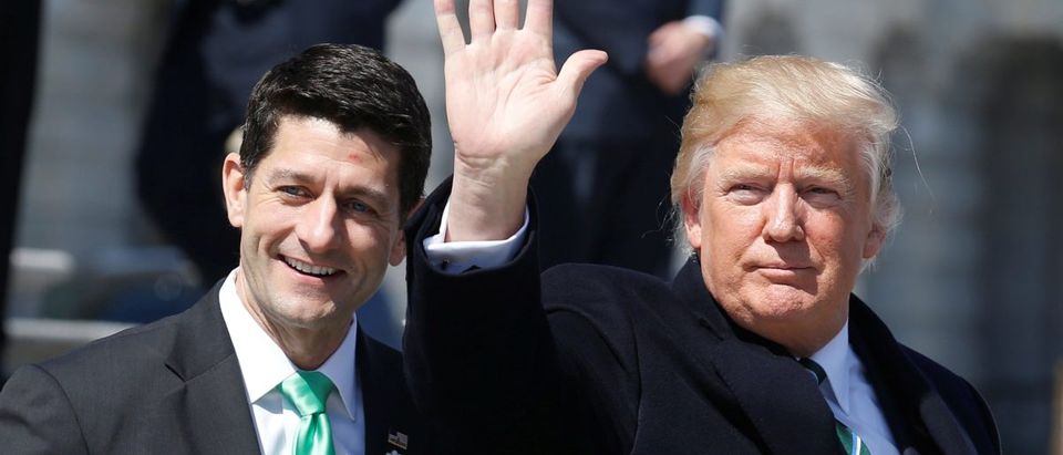U.S. President Donald Trump waves with Speaker of the House Paul Ryan (R-WI) after attending a Friends of Ireland reception on Capitol Hill in Washington, U.S., March 16, 2017. REUTERS/Joshua Roberts