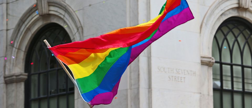 Shutterstock/ PHILADELPHIA - JUNE 8: People waiving gay flag at the 26th Annual Pride Parade on the streets of Center City Philadelphia. Hundreds march to support same sex marriage