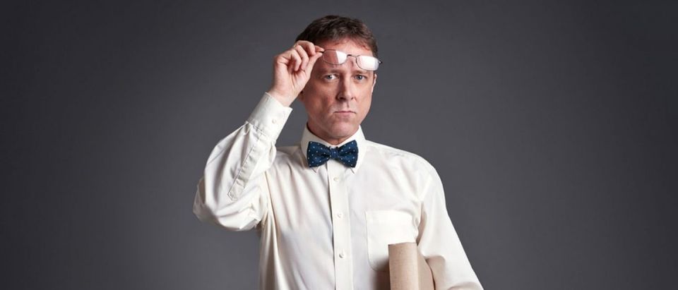 Professor raises his spectacles (Spectral-Design/Shutterstock)