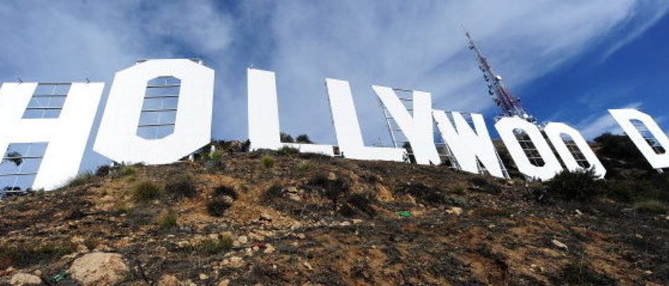 The freshly painted Hollywood Sign is seen after a press conference to announce the completion of the famous landmark's major makeover, December 4, 2012 in Hollywood, California. Some 360 gallons (around 1,360 liters) of paint and primer were used to provide the iconic sign with it most extensive refurbishment in almost 35 years in advance of it's 90th birthday next year. AFP PHOTO / Robyn Beck (Photo credit should read ROBYN BECK/AFP/Getty Images)