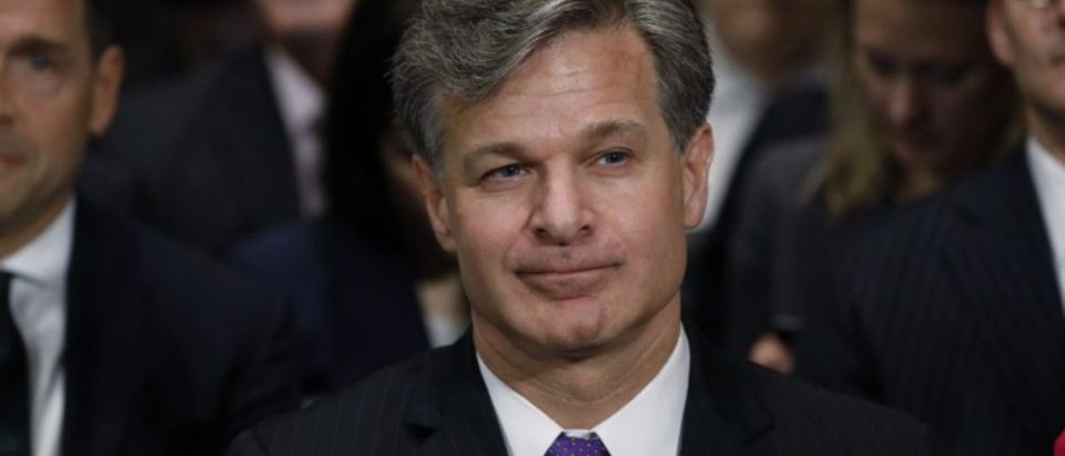 Wray is seated prior to testifying before Senate Judiciary Committee confirmation hearing on Capitol Hill in Washington