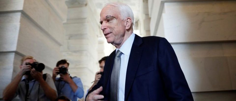 Senator John McCain (R-AZ), recently diagnosed with an aggressive form of brain cancer, departs after returning to the Senate to vote on health care legislation on Capitol Hill in Washington