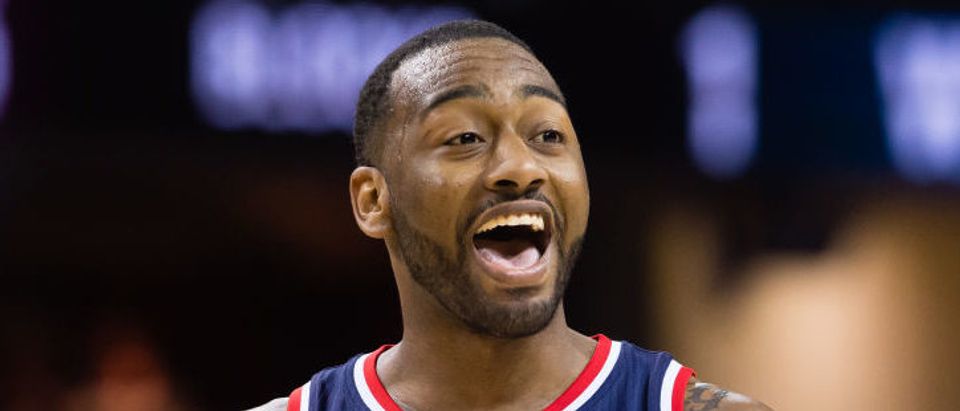 John Wall #2 of the Washington Wizards reacts during the second half against the Cleveland Cavaliers at Quicken Loans Arena on March 25, 2017 in Cleveland, Ohio. The Wizards defeated the Cavaliers 127-115. (Photo by Jason Miller/Getty Images)