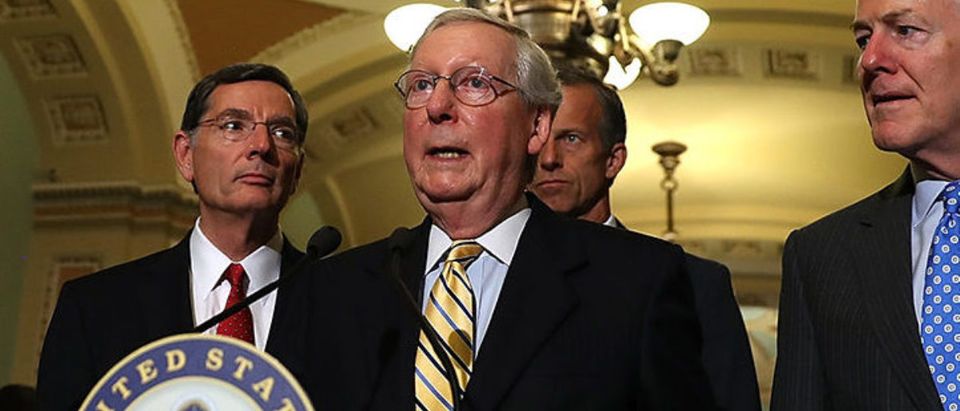 U.S. Sen. John Barrasso (R-WY), Senate Majority Leader Mitch McConnell (R-KY), U.S. Sen. John Thune (R-SD) and U.S. Sen. John Cornyn (R-TX) speak to reporters during a news conference on Capitol Hill following a procedural vote on the GOP health care bill on July 25, 2017 in Washington, DC. U.S. Vice President Mike Pence cast the tying vote on a procedural vote to move forward on the GOP health care bill. (Photo by Justin Sullivan/Getty Images)