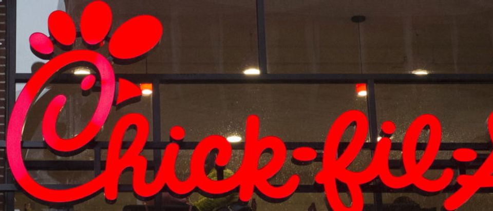 A franchise sign is seen above a Chick-fil-A freestanding restaurant after its grand opening in Midtown, New York