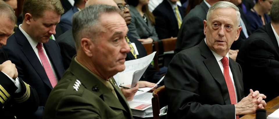 U.S. Defense Secretary James Mattis (R) and Joint Chiefs Chairman Marine Gen. Joseph Dunford wait to testify before a House Armed Services Committee hearing on the Pentagon's budget priorities on Capitol Hill in Washington, U.S., June 12, 2017. REUTERS/Yuri Gripas.