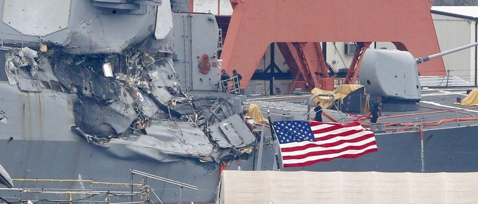 The Arleigh Burke-class guided-missile destroyer USS Fitzgerald, damaged by colliding with a Philippine-flagged merchant vessel, is seen at the U.S. naval base in Yokosuka