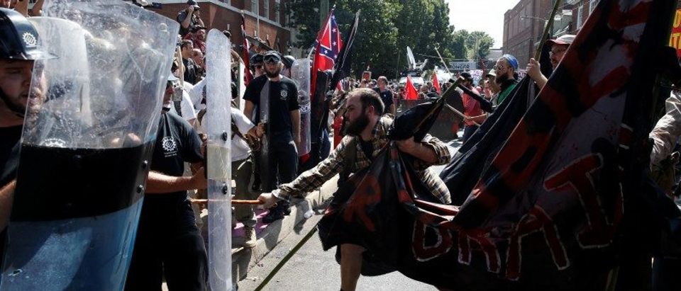 Members of white nationalists clash against a group of counter-protesters in Charlottesville Virginia